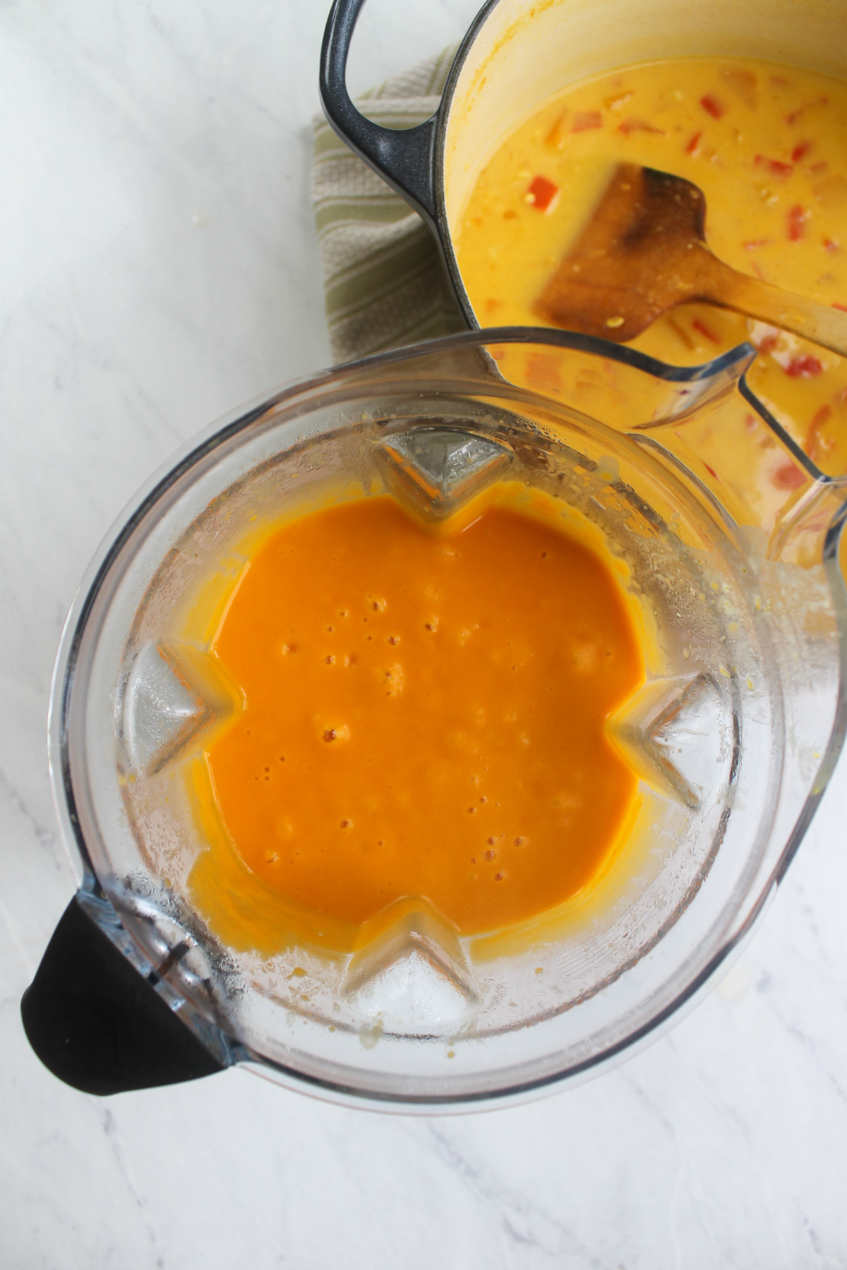 A blender full of butternut squash ginger soup.