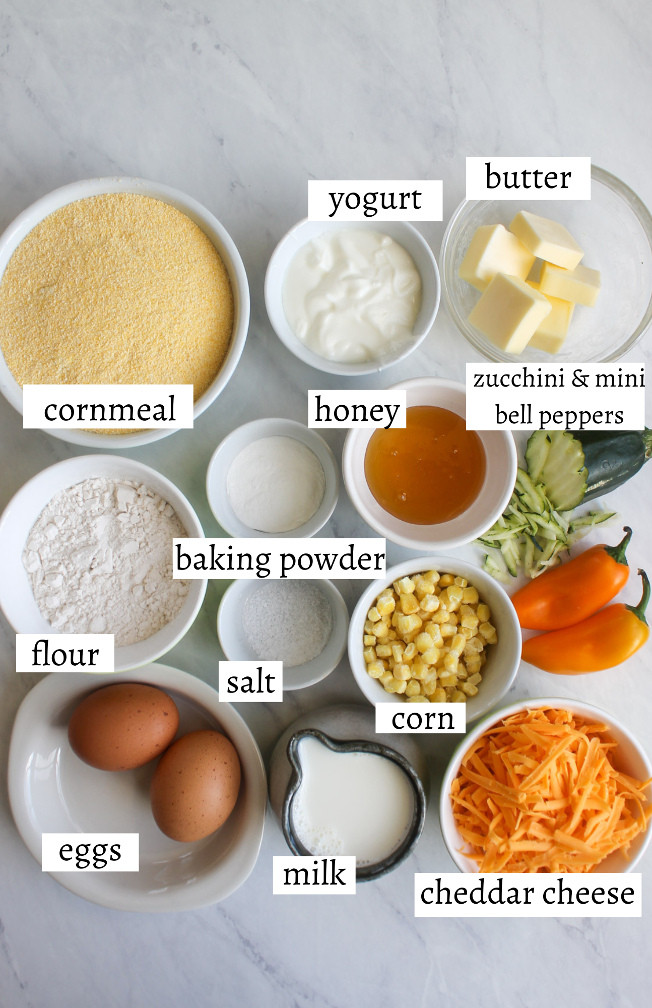 Labeled ingredients for cheesy honey skilet cornbread.
