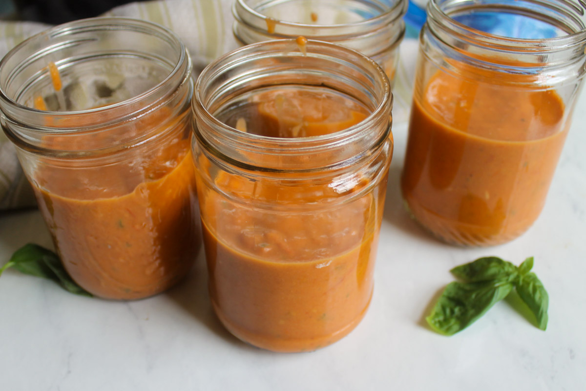 Four jars of freezer tomato soup from garden tomatoes.
