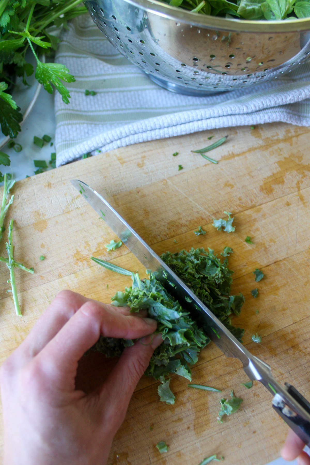 Wad up kale and other herb leaves into tight bundles before running your knife through them.