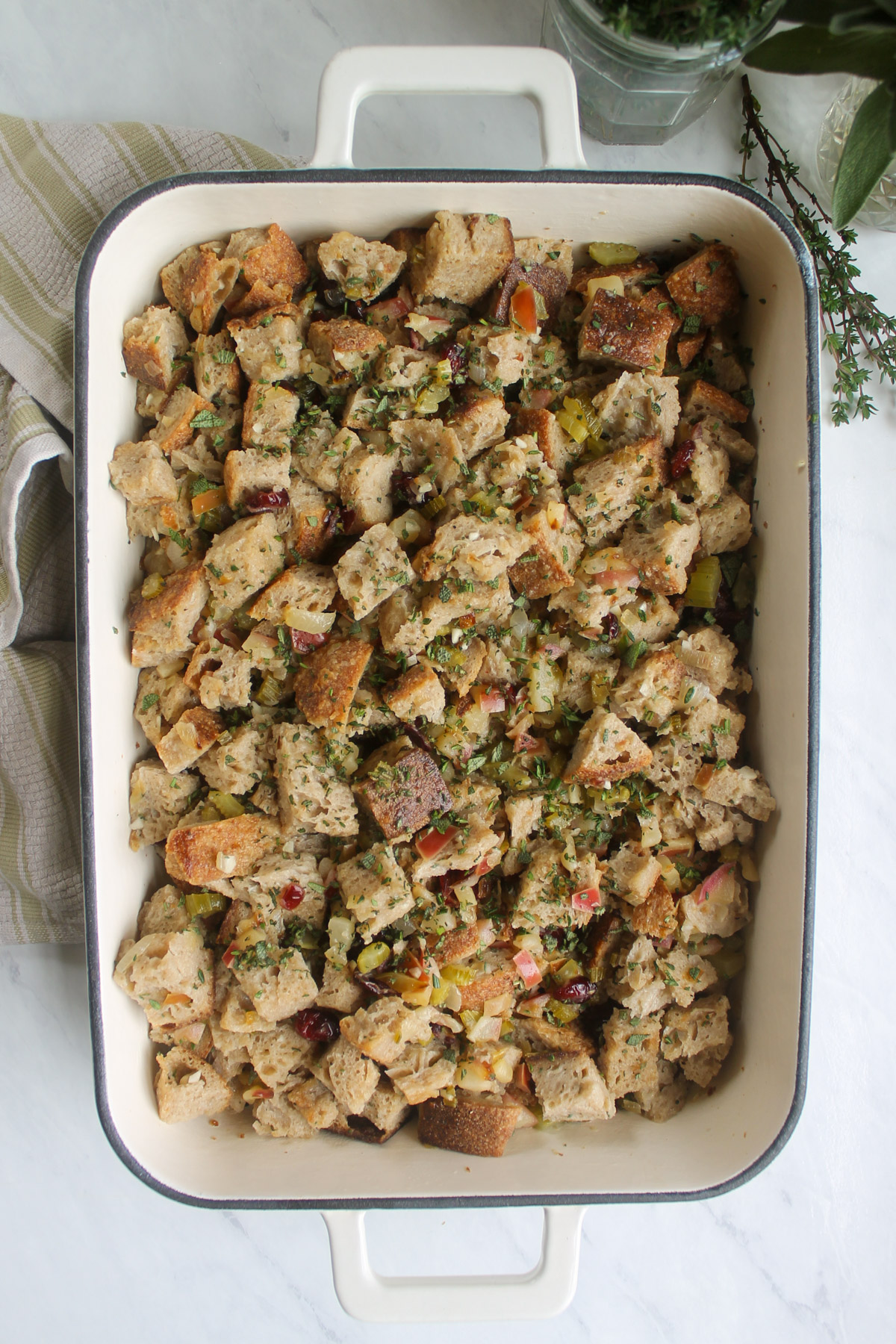 The stuffing in a casserole dish ready to bake.