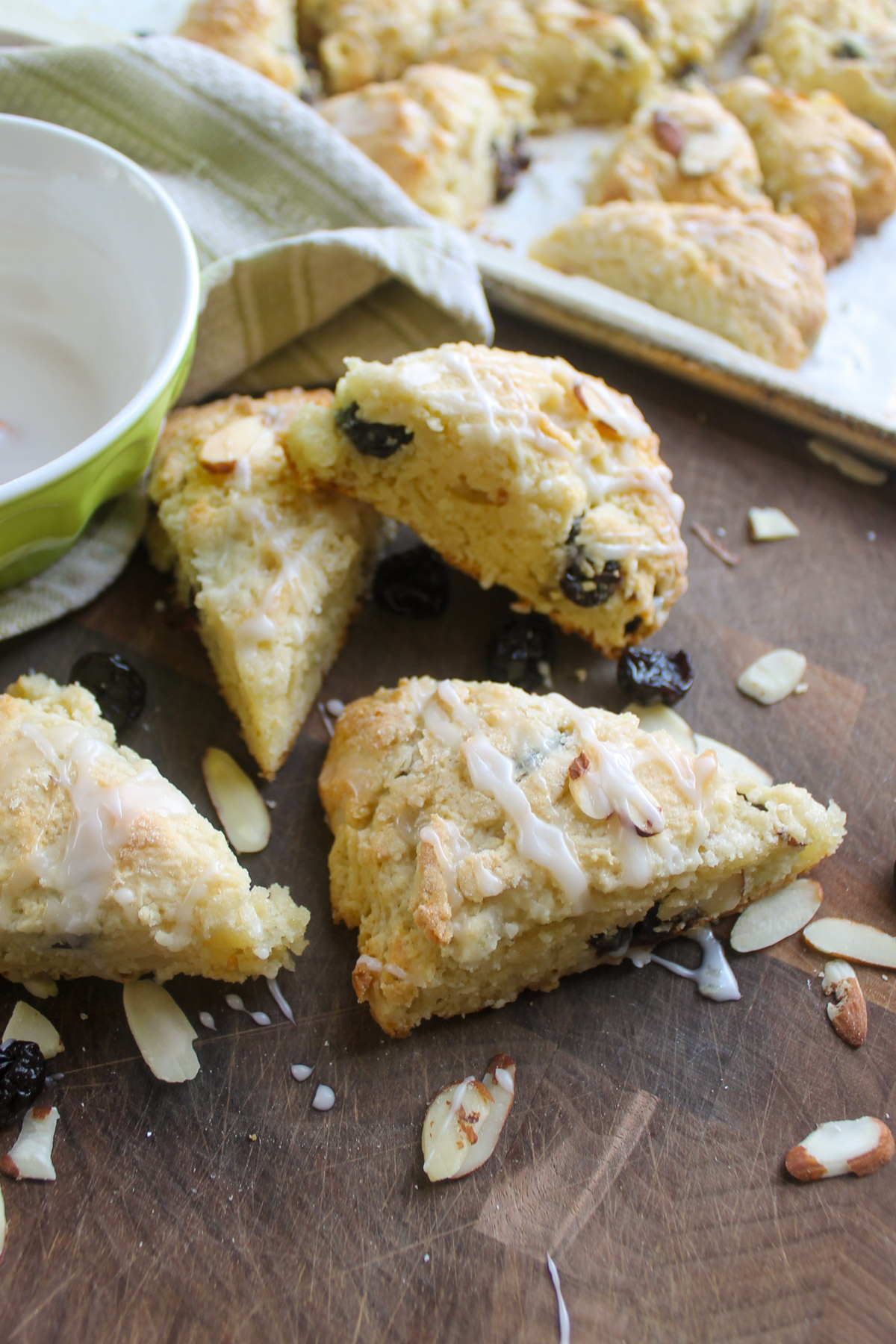 Almond Cherry Scone wedges on a cutting board.