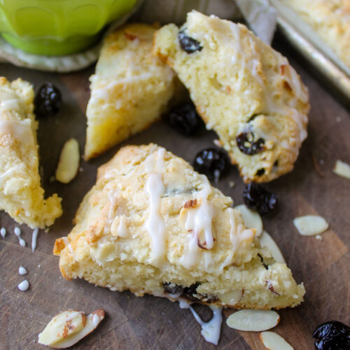 Almond scones with dried cherries and drizzled with icing.