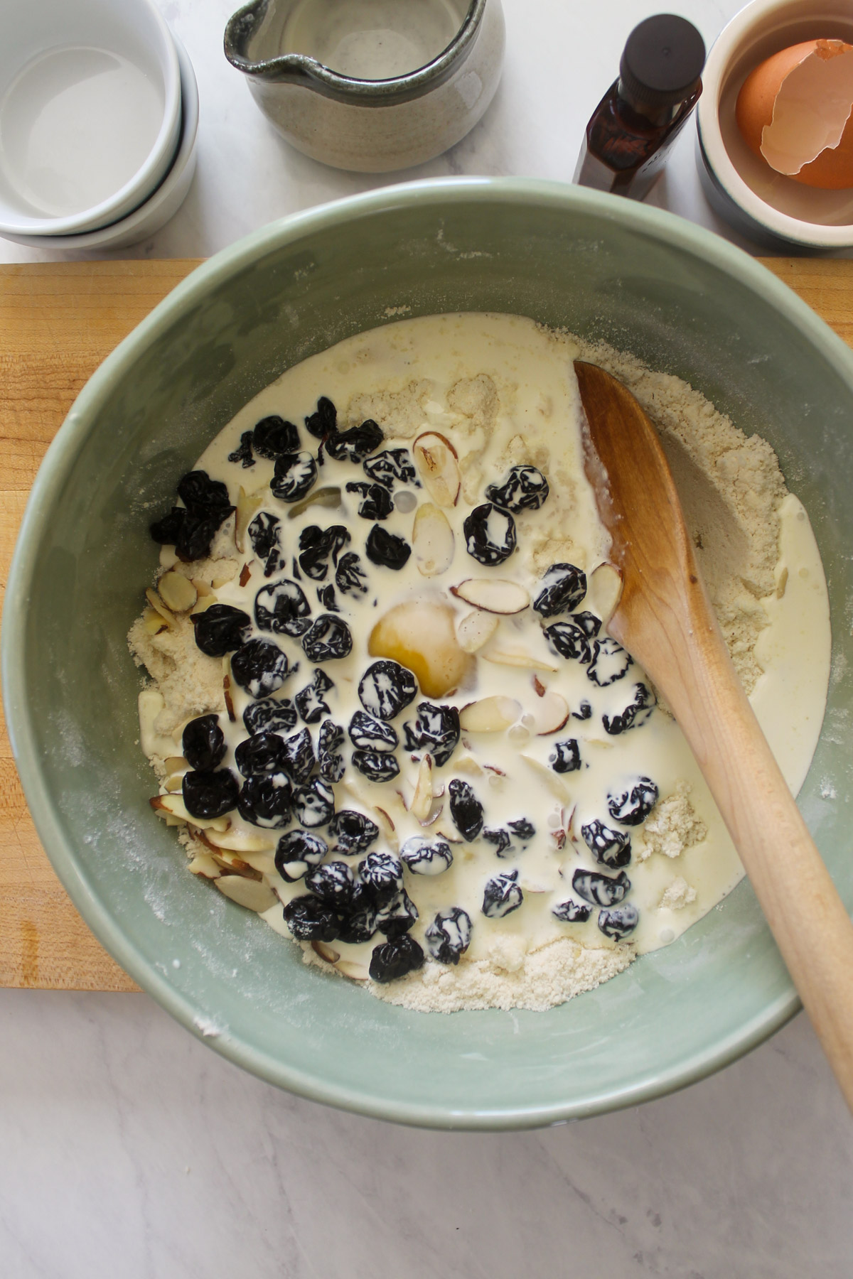 Adding wet ingredients to dry ingredients for scones.