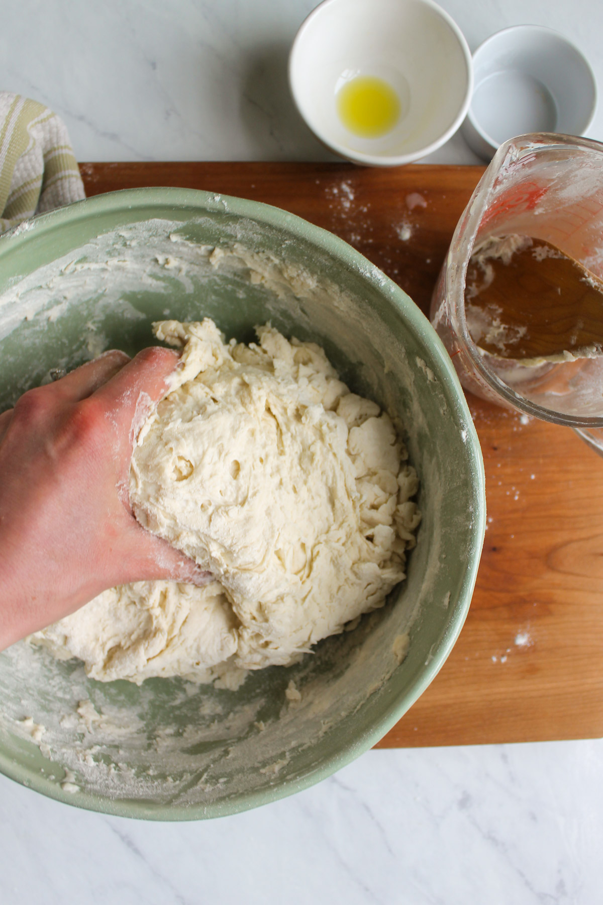Mixing the dough ball by hand.