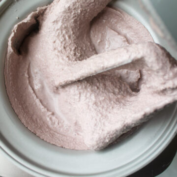 Mulberry ice cream churned in an ice cream maker.
