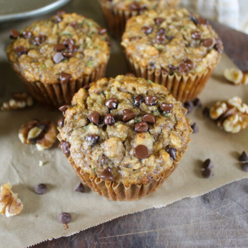 Banana Zucchini Muffins on a cutting board.