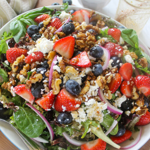 Strawberry Blueberry Salad with goat cheese and brown sugar walnuts.