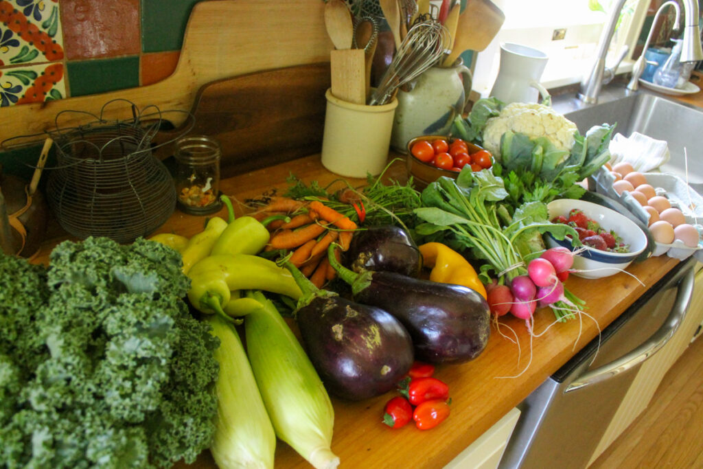 Farmer's Market produce on a kitchen counter.