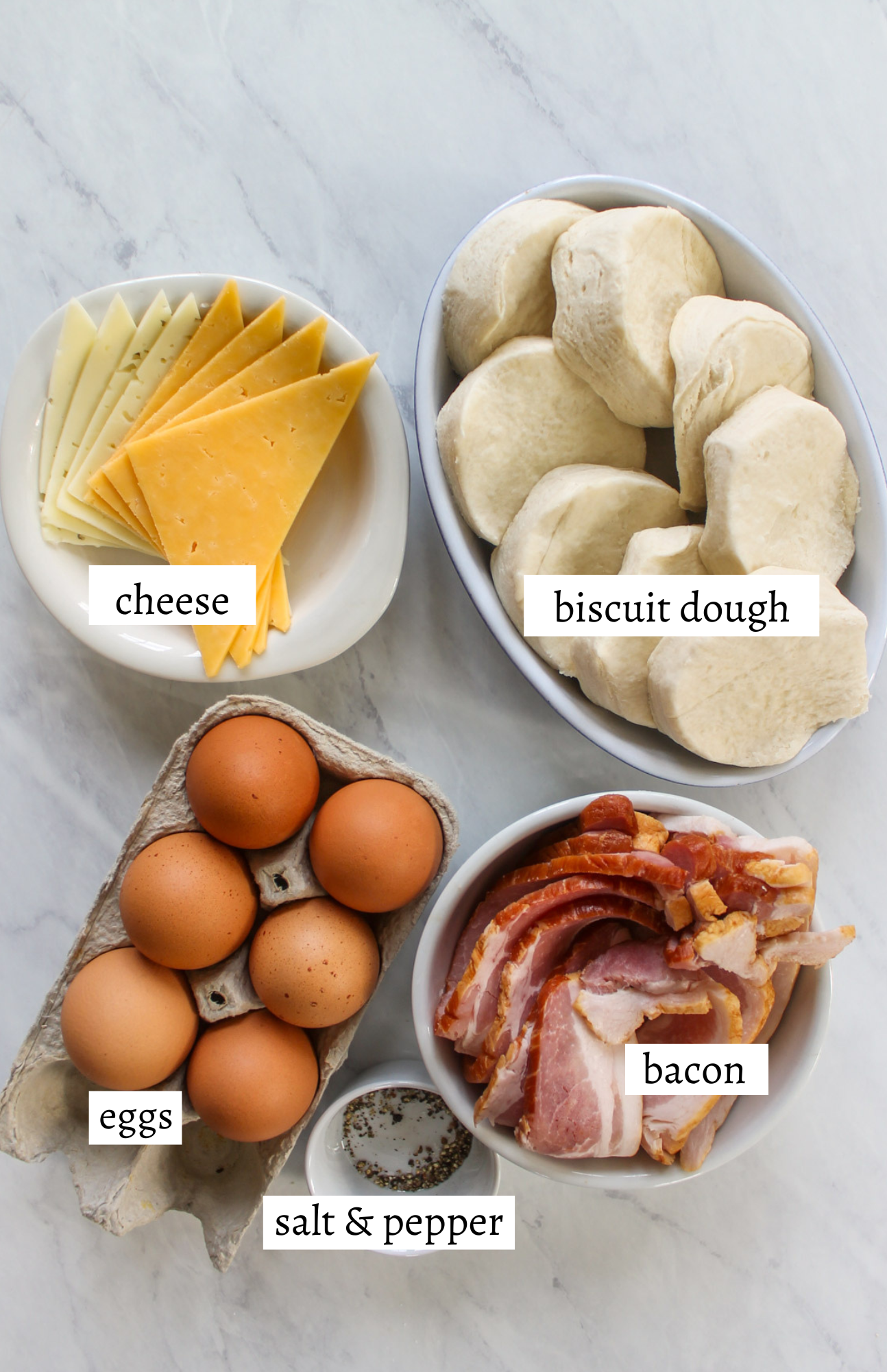 Labeled ingredients for Bacon Egg and Cheese Biscuit Sandwiches.