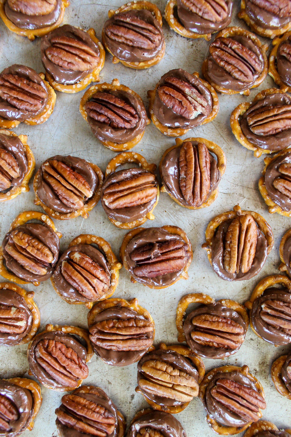 Rolo Pretzel Turtles on a sheet pan.
