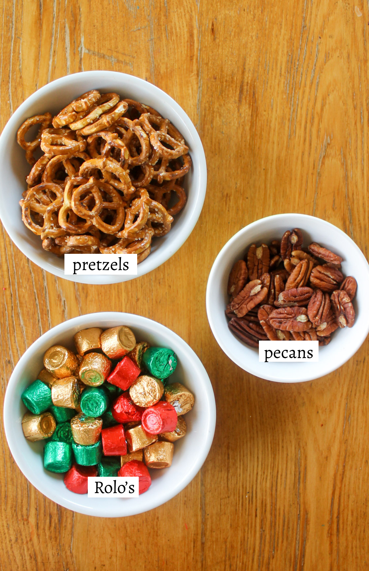 Labeled ingredients for Rolo Turtle Pretzel Bites.