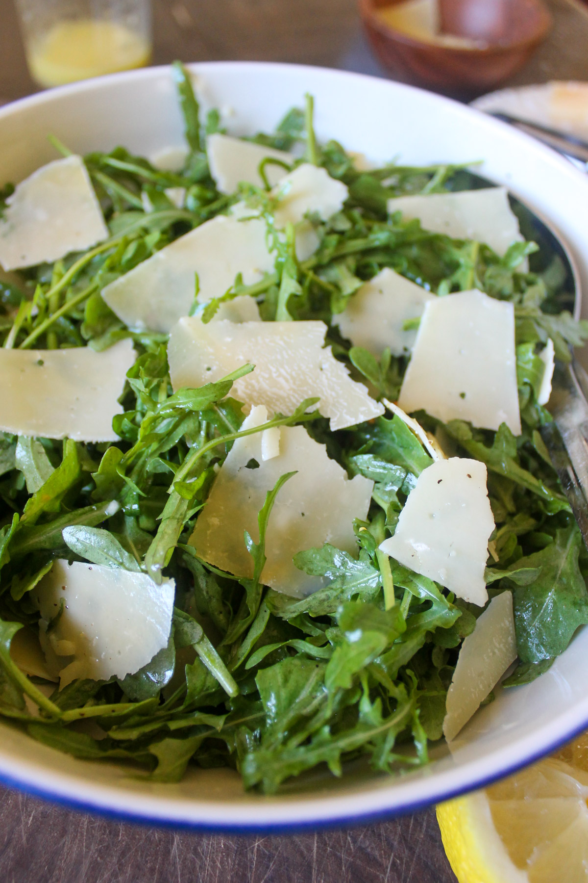 Arugula Parmesan salad tossed with lemon dressing.