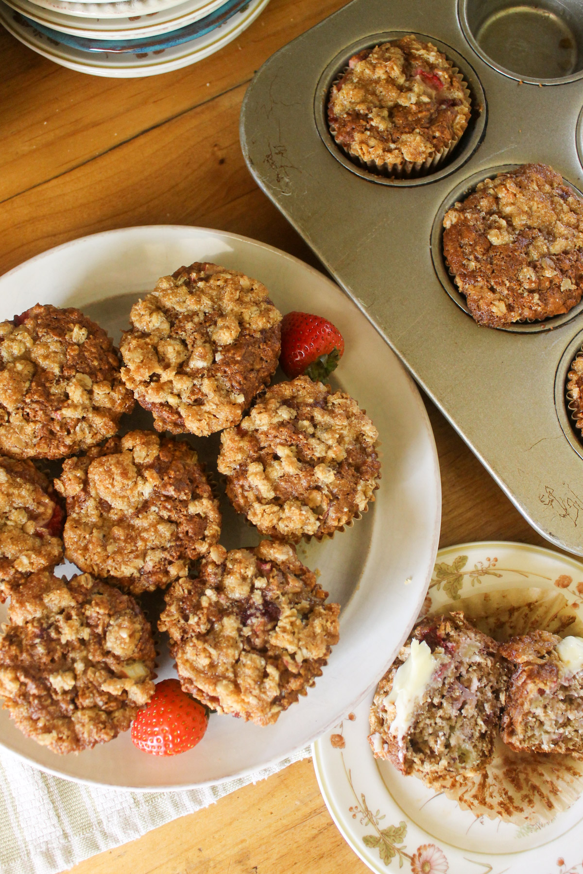 Strawberry Rhubarb Muffins on a white plate.