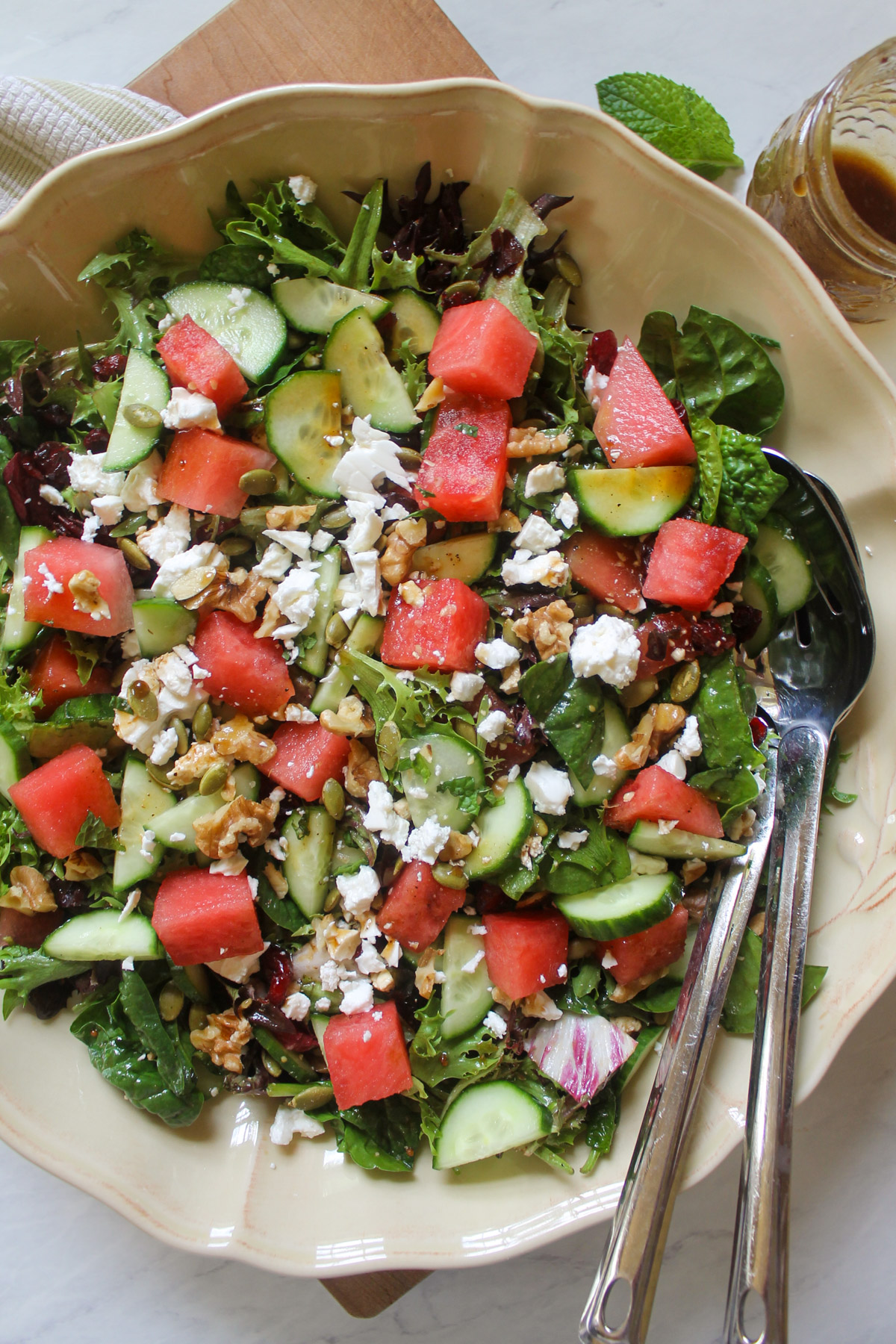 A salad bowl of Watermelon Cucumber Salad with Mint.