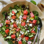 Watermelon Cucumber Salad with feta cheese and balsamic vinaigrette in a salad bowl.