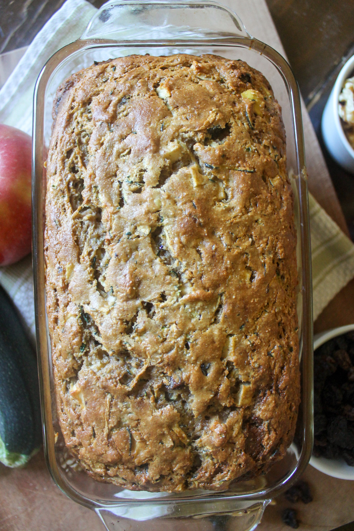A loaf of baked zucchini apple bread.