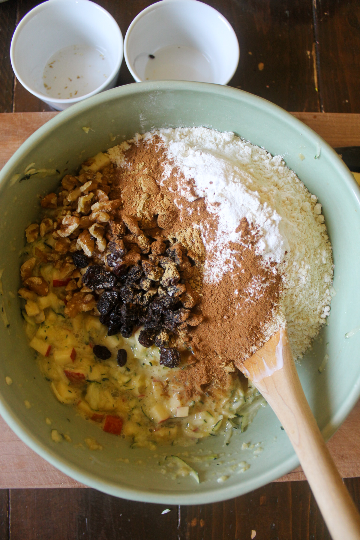 Dry ingredients and spices added to Apple Zucchini Bread batter.